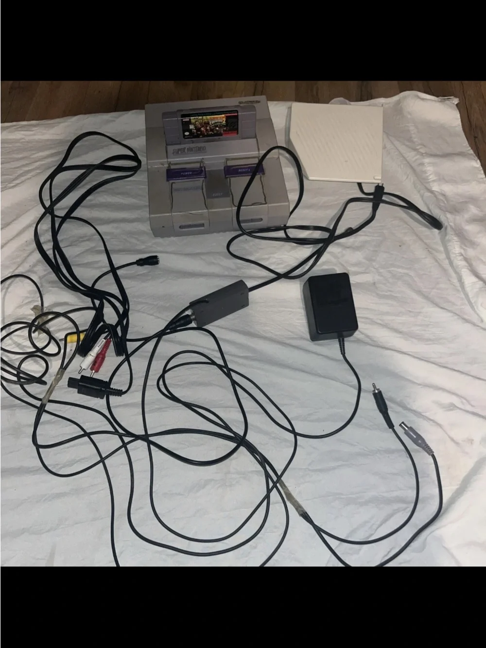 Nintendo SNES Classic Gray Console with Purple Switch Accents and Black Cables